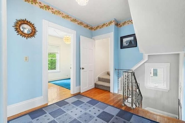 6 Francis Ave, Wakefield, MA 01880 - hall with wood finished floors, stairs, and baseboards