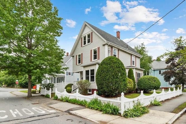 6 Francis Ave, Wakefield, MA 01880 - view of property exterior with a chimney