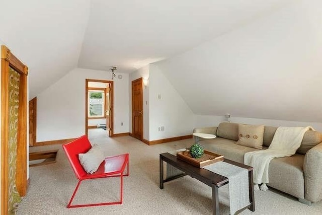6 Francis Ave, Wakefield, MA 01880 - carpeted living room with vaulted ceiling and baseboards