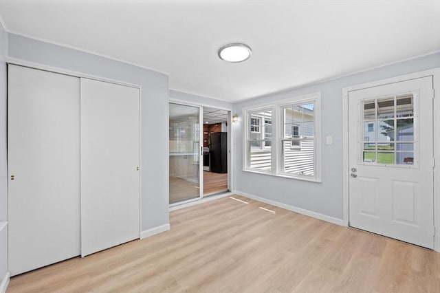 11 Shale St, Worcester, MA 01604 - entryway with light wood-type flooring and baseboards