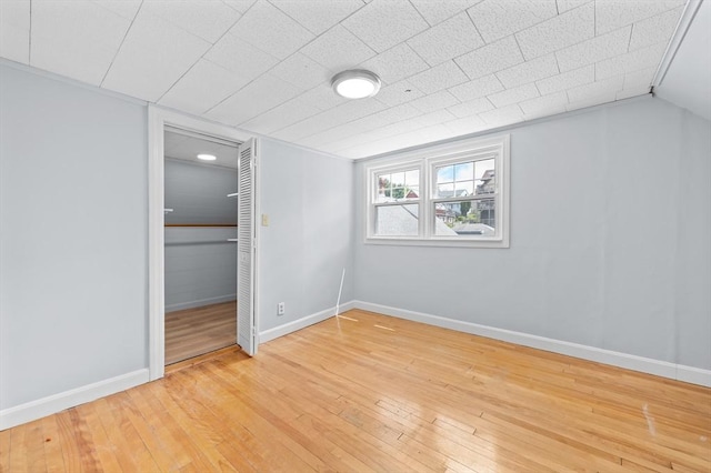 11 Shale St, Worcester, MA 01604 - unfurnished bedroom with hardwood / wood-style floors, baseboards, and a closet