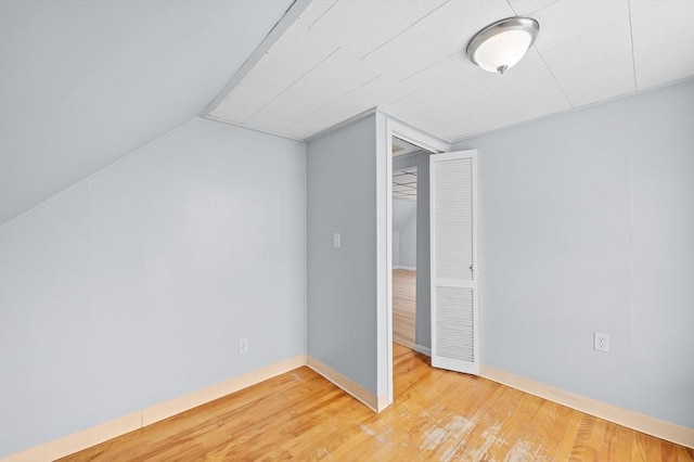 11 Shale St, Worcester, MA 01604 - additional living space featuring wood finished floors, vaulted ceiling, and baseboards