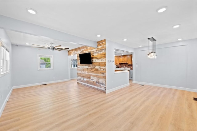 11 Shale St, Worcester, MA 01604 - unfurnished living room featuring baseboards, light wood-style flooring, recessed lighting, a ceiling fan, and beamed ceiling