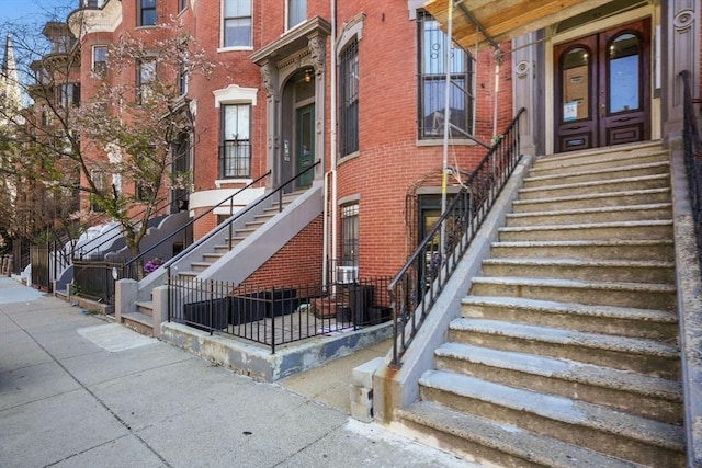 762 Tremont St Unit 5, Boston, MA 02118 - doorway to property with brick siding and french doors
