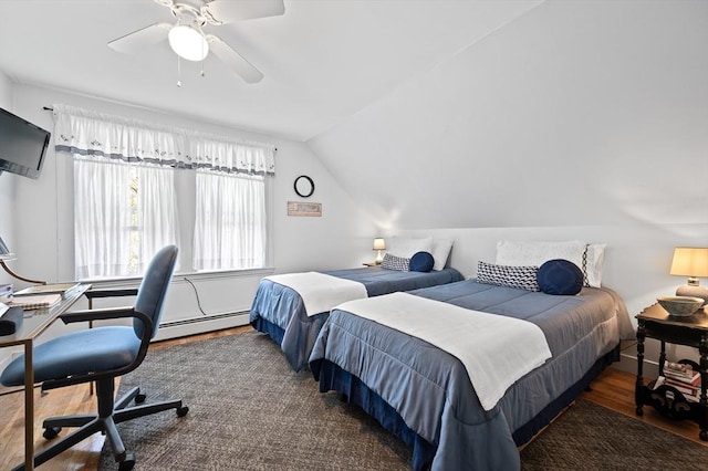 bedroom with a baseboard radiator, wood finished floors, vaulted ceiling, and ceiling fan