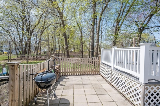 view of patio featuring a grill