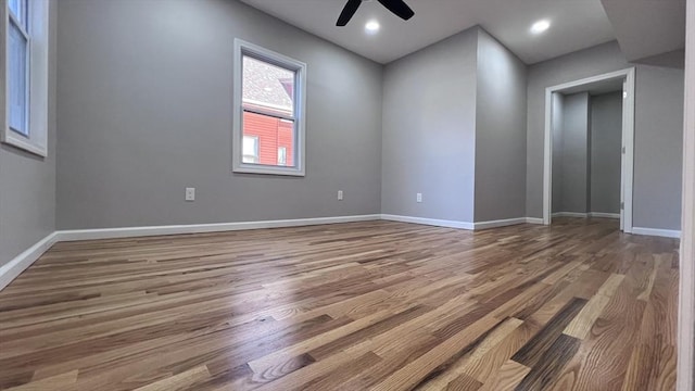 spare room featuring ceiling fan and wood-type flooring