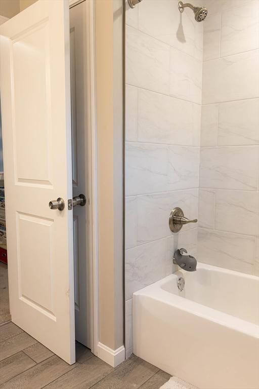 82 Davenport St, Springfield, MA 01119 - bathroom with wood finished floors and bathing tub / shower combination