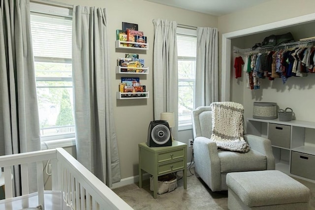 82 Davenport St, Springfield, MA 01119 - bedroom featuring a nursery area, light carpet, a closet, and baseboards