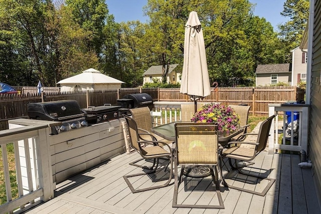 82 Davenport St, Springfield, MA 01119 - deck featuring outdoor dining space, a fenced backyard, and grilling area
