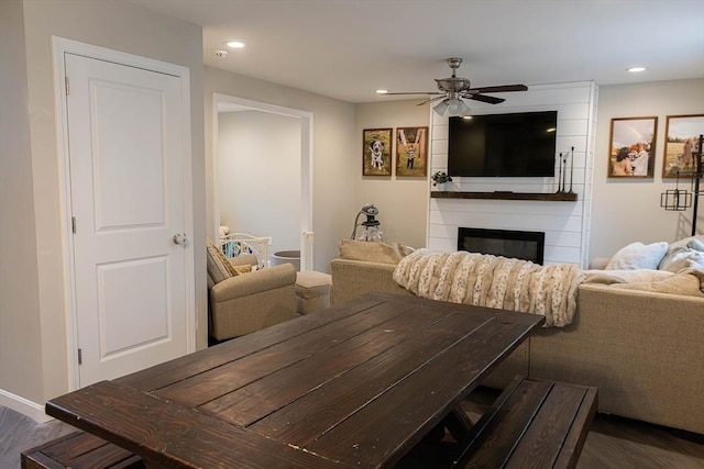 82 Davenport St, Springfield, MA 01119 - dining room featuring ceiling fan, dark wood-style flooring, a fireplace, and recessed lighting