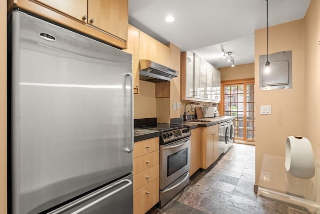 15 Concord Sq Unit 1A, Boston, MA 02118 - kitchen featuring appliances with stainless steel finishes, range hood, light brown cabinets, dark countertops, and a sink
