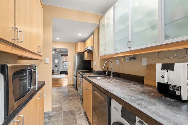 15 Concord Sq Unit 1A, Boston, MA 02118 - kitchen featuring a sink, dark countertops, stainless steel appliances, dark stone finish floors, and ceiling fan