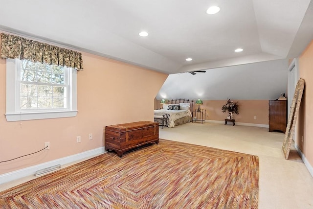 carpeted bedroom featuring recessed lighting, visible vents, lofted ceiling, and baseboards