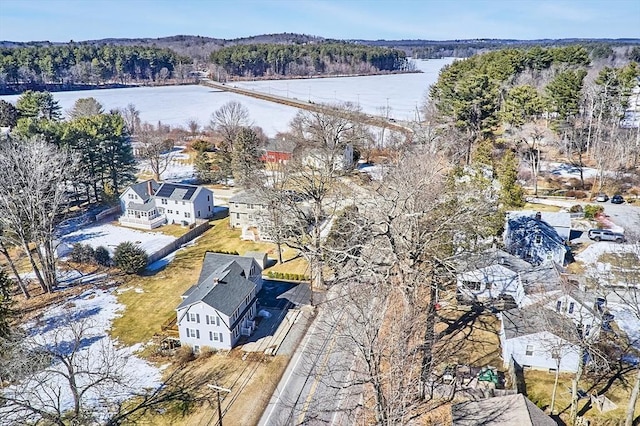 drone / aerial view featuring a view of trees