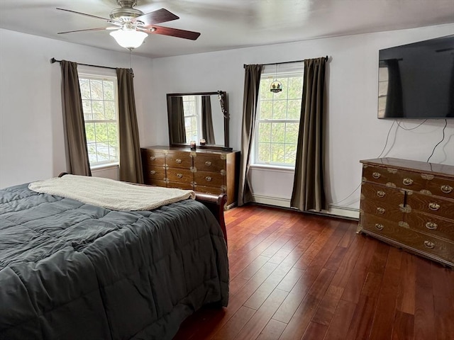16 E Rd, Adams, MA 01220 - bedroom featuring a baseboard heating unit, a ceiling fan, and dark wood-style flooring