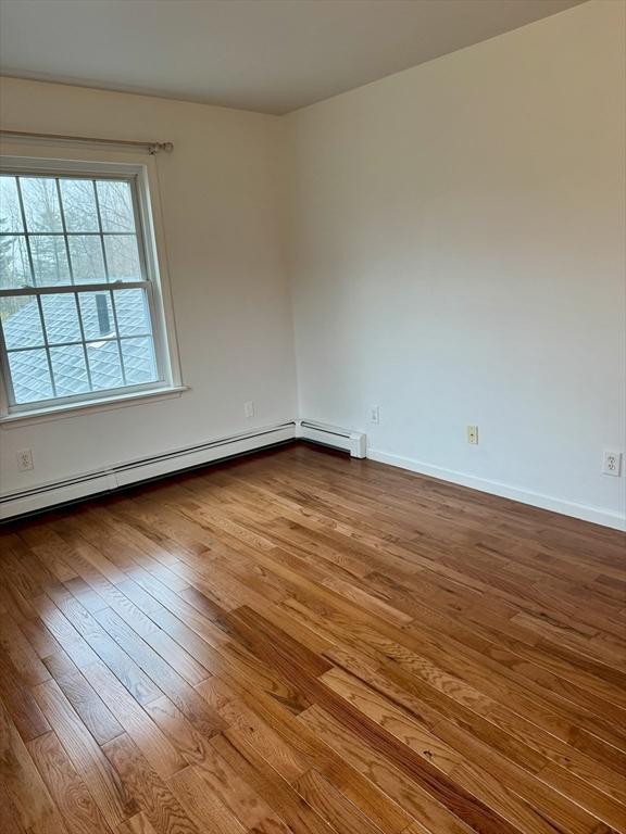 16 E Rd, Adams, MA 01220 - spare room featuring baseboards and dark wood finished floors