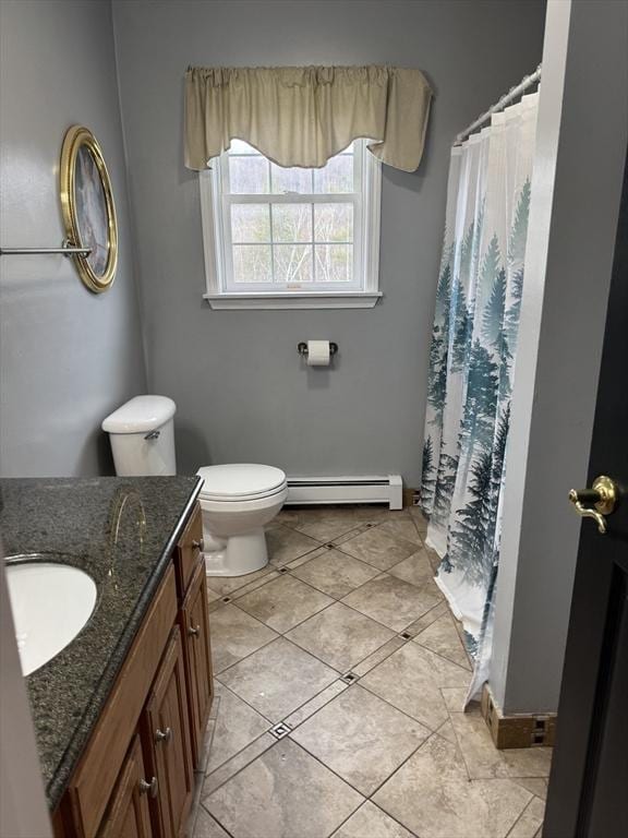 16 E Rd, Adams, MA 01220 - bathroom featuring tile patterned flooring, toilet, vanity, a shower with curtain, and baseboard heating