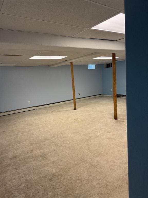 16 E Rd, Adams, MA 01220 - finished below grade area with a paneled ceiling and carpet