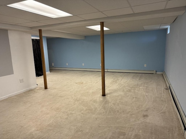 16 E Rd, Adams, MA 01220 - finished basement with a baseboard heating unit, baseboards, a drop ceiling, and carpet