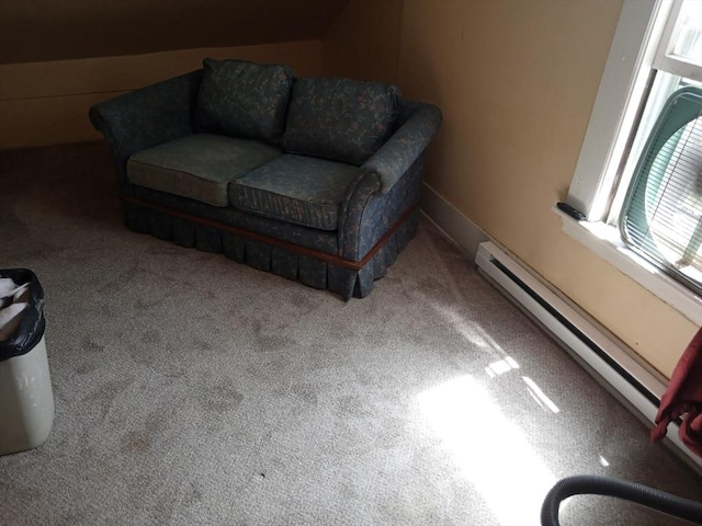 15 Green St, Gardner, MA 01440 - living area featuring a baseboard heating unit and carpet floors