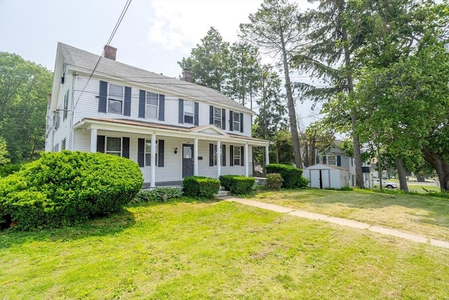 15 Green St, Gardner, MA 01440 - colonial inspired home with a storage shed, a chimney, a porch, and a front yard