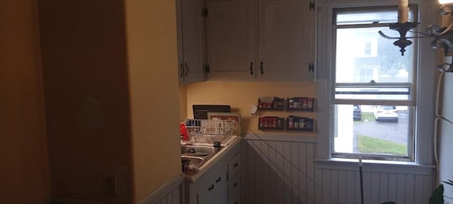 15 Green St, Gardner, MA 01440 - kitchen featuring white cabinetry and light countertops