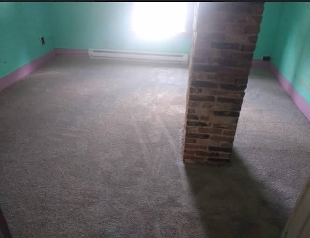 15 Green St, Gardner, MA 01440 - carpeted empty room featuring baseboard heating and baseboards