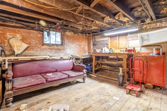 15 Green St, Gardner, MA 01440 - basement with wood-type flooring and a workshop area