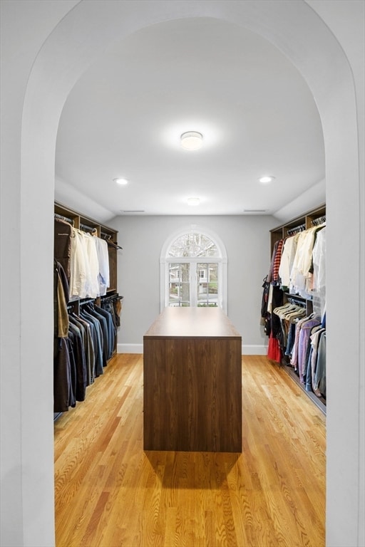 walk in closet featuring light wood-type flooring