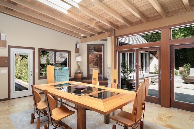 sunroom featuring wooden ceiling, lofted ceiling with skylight, and french doors