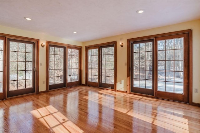 doorway with light hardwood / wood-style floors