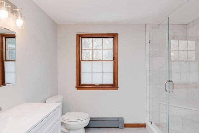 bathroom with a shower with door, tile patterned flooring, a baseboard heating unit, vanity, and toilet