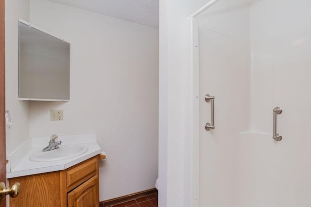 bathroom featuring vanity and tile patterned flooring