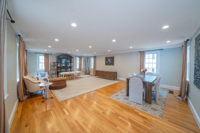 642 Centre St, Newton, MA 02458 - living area featuring ornamental molding, light wood-style flooring, recessed lighting, healthy amount of natural light, and baseboards