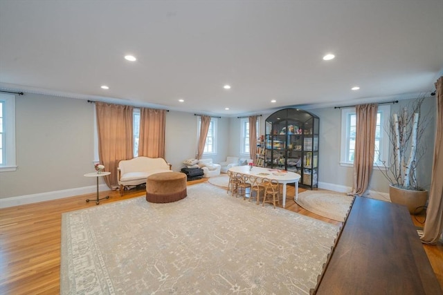 642 Centre St, Newton, MA 02458 - living area featuring recessed lighting, wood finished floors, baseboards, and plenty of natural light