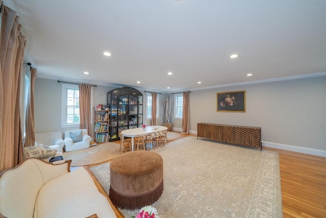 642 Centre St, Newton, MA 02458 - living area featuring crown molding, recessed lighting, wood finished floors, and baseboards