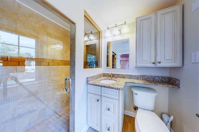 642 Centre St, Newton, MA 02458 - full bathroom with a shower stall, toilet, and vanity