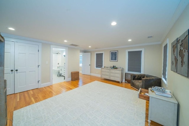 642 Centre St, Newton, MA 02458 - bedroom with ornamental molding, light wood-style floors, recessed lighting, baseboards, and connected bathroom