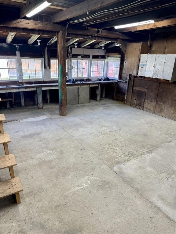 misc room featuring a wealth of natural light and a workshop area