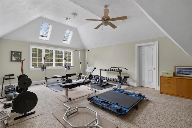 workout area featuring baseboards, visible vents, a ceiling fan, light colored carpet, and high vaulted ceiling