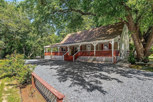 farmhouse-style home with covered porch