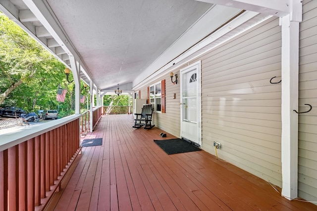 wooden terrace featuring a porch