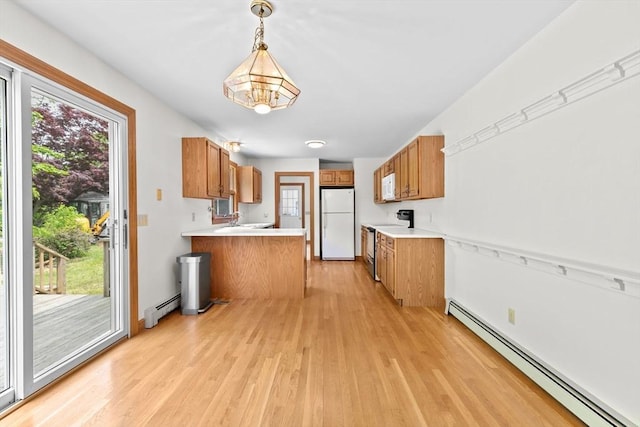 3 Plymouth Heights Rd, Bourne, MA 02562 - kitchen featuring white appliances, baseboard heating, light wood-type flooring, and a peninsula