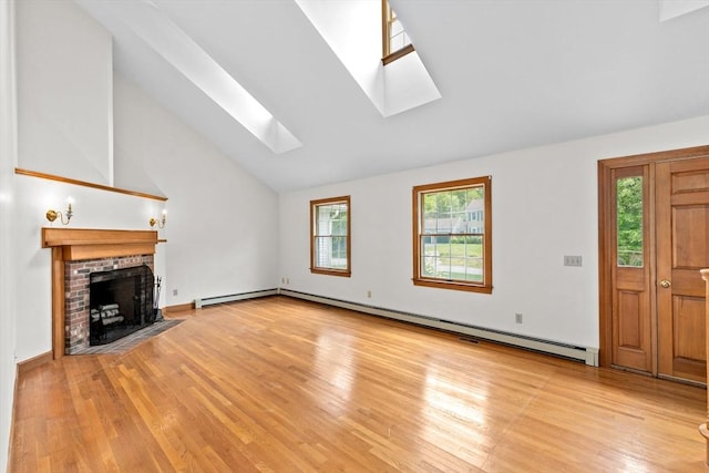 3 Plymouth Heights Rd, Bourne, MA 02562 - unfurnished living room with a skylight, lofted ceiling, light wood-style floors, baseboard heating, and healthy amount of natural light