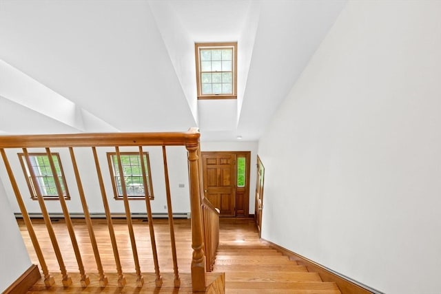3 Plymouth Heights Rd, Bourne, MA 02562 - stairway with high vaulted ceiling, wood finished floors, and plenty of natural light
