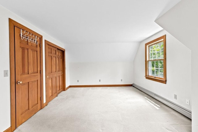 3 Plymouth Heights Rd, Bourne, MA 02562 - additional living space featuring a baseboard heating unit, light colored carpet, lofted ceiling, and baseboards