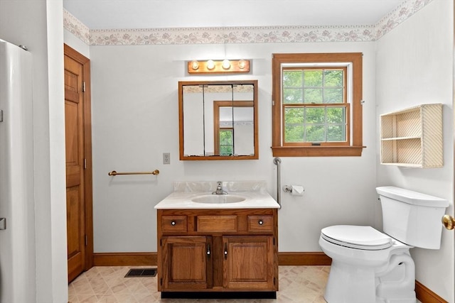 3 Plymouth Heights Rd, Bourne, MA 02562 - bathroom featuring baseboards, vanity, and toilet