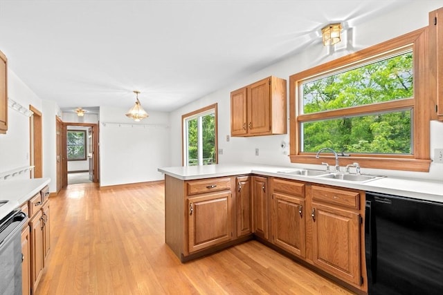 3 Plymouth Heights Rd, Bourne, MA 02562 - kitchen featuring a sink, a peninsula, dishwasher, and light countertops