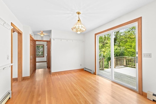 3 Plymouth Heights Rd, Bourne, MA 02562 - unfurnished room featuring a baseboard heating unit and plenty of natural light